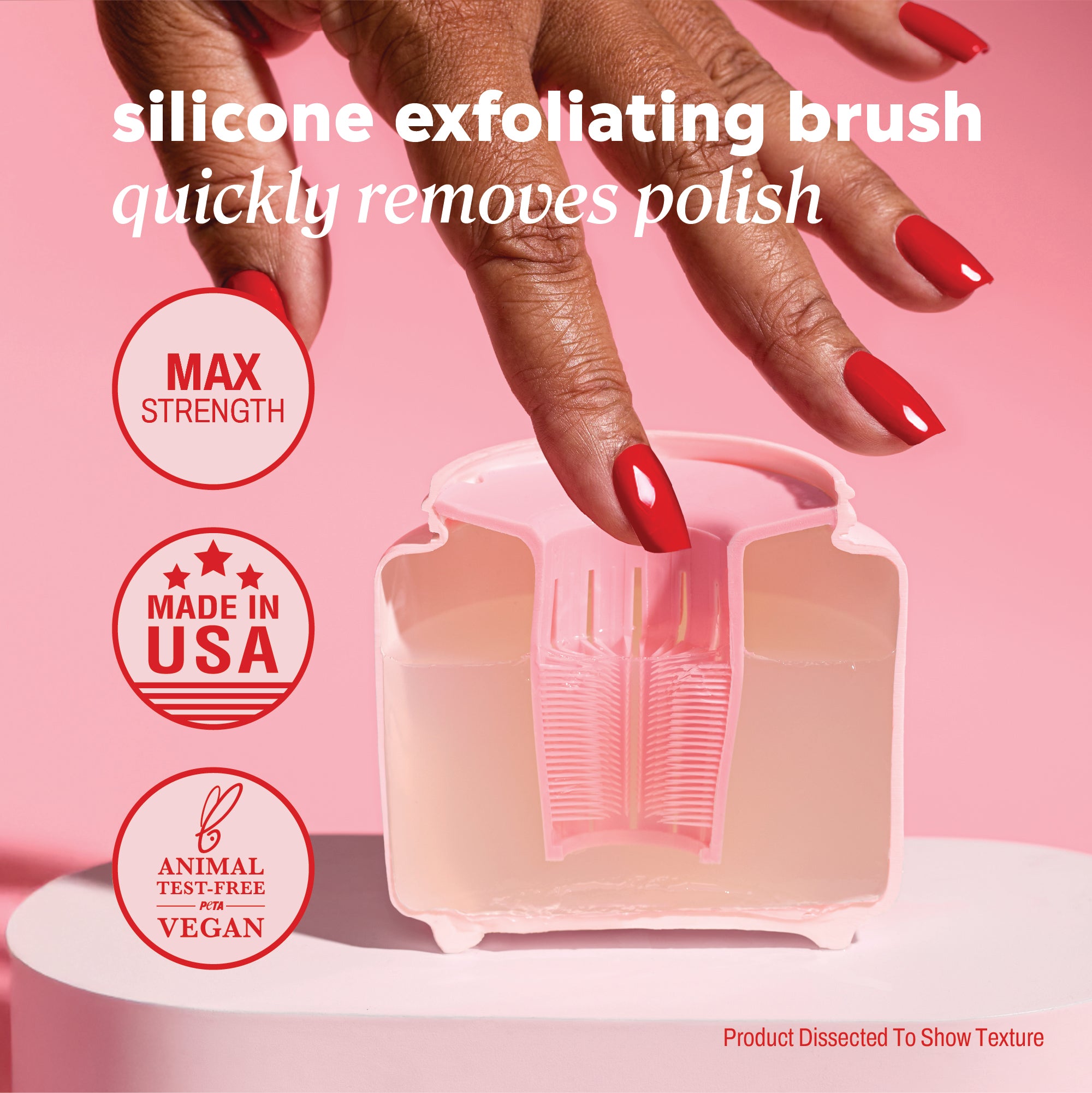  Fingertips using the built‑in scrubber with header text “silicone exfoliating brush quickly removes polish” and icons reading “max strength,” “made in USA,” and “animal test‑free vegan.”
