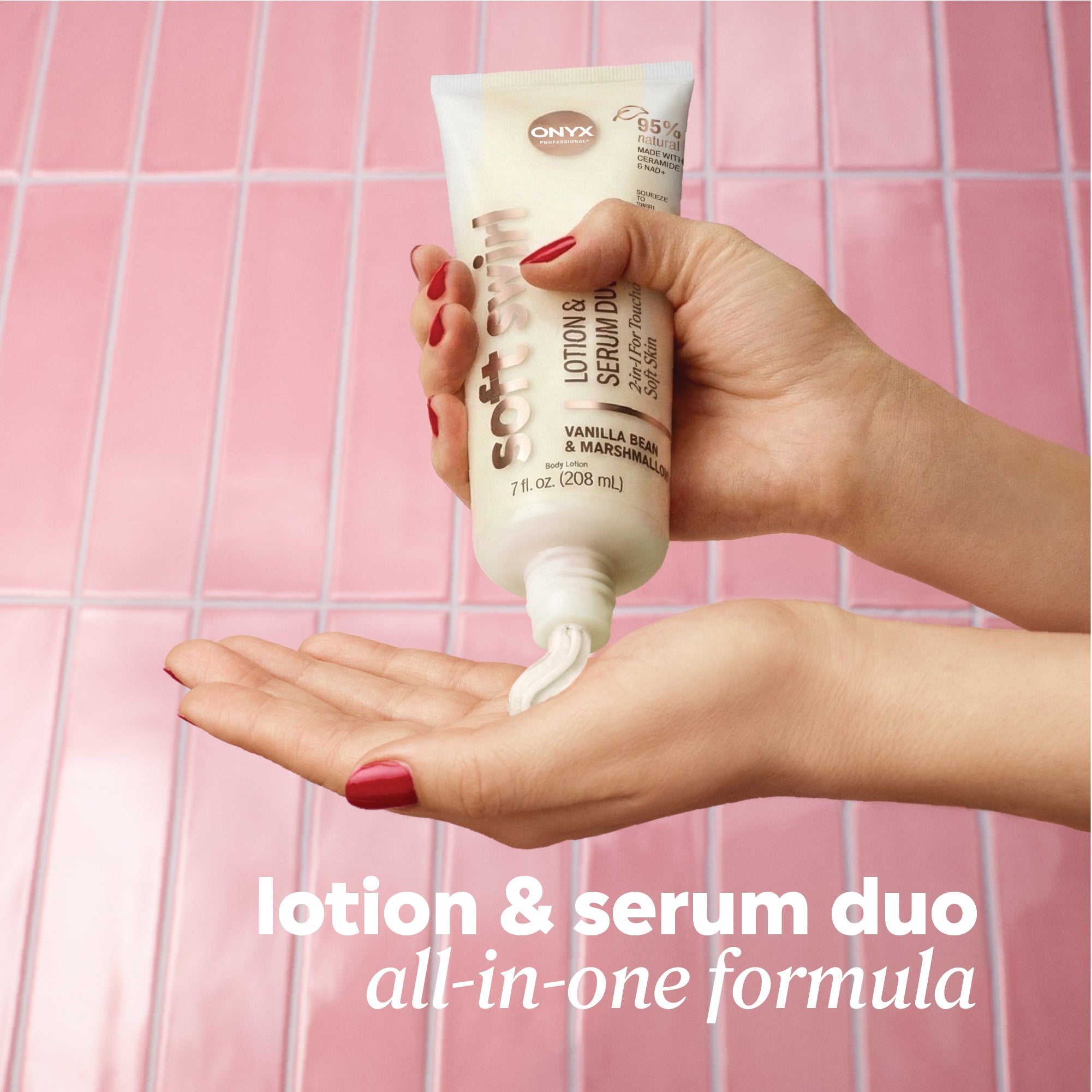 Product being dispensed from a Soft Skin Lotion & Serum Duo tube into an open hand against a pink tile background. Text reads ‘lotion & serum duo all‑in‑one formula.'