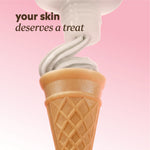 Lotion being placed like a soft‑serve swirl in a waffle cone on a pink gradient background with text that reads ‘your skin deserves a treat.’
