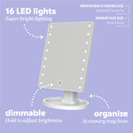 LED vanity mirror with callouts reading “16 LED lights super bright lighting,” “dimmable hold to adjust brightness,” “organize accessory tray base,” and mirror dimensions listed as “mirror max standing size 10.5 in x 6.7 in x 4.7 in” and “mirror face size 8.4 in x 6.4 in.”