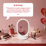 Review text reading “This mirror is a game‑changer, perfect for on‑the‑go touch‑ups, effortlessly fitting into any handbag or suitcase.” credited to Amy.